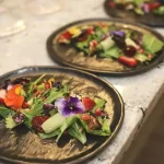 a group of 3 plates of food created by a private chef in virginia beach. luxury event planner