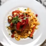 a plate of food on a table created by a private chef in virginia beach